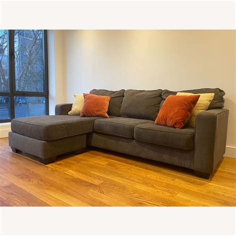 ashley furniture hodan grey sofa  reversible chaise aptdeco