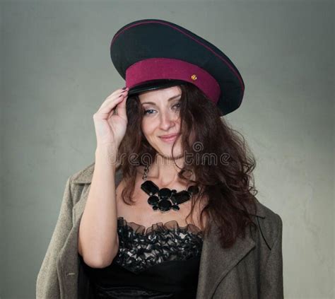 Portrait Of Cheerful Soviet Woman In Military Cap And Jacket Stock