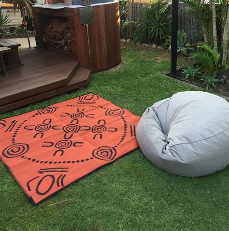 gatherings aboriginal design mats orange black recycled mats