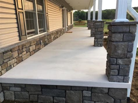 elevated concrete porch  stone accents blackwater