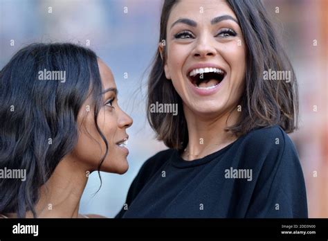 Mila Kunis Attends The Ceremony Honoring Zoe Saldana With A Star On The
