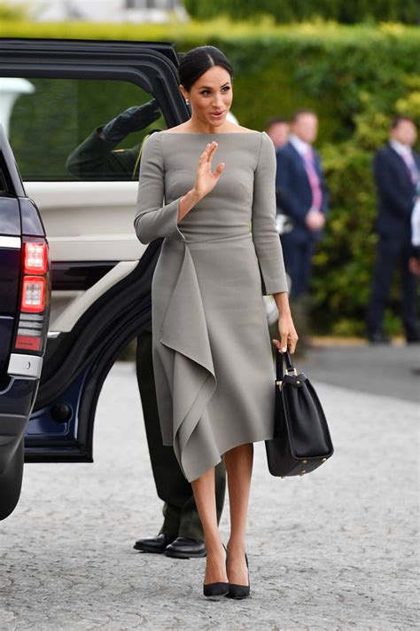 meghan markle for day two in dublin meghan wore a grey dress with her favourite neckline