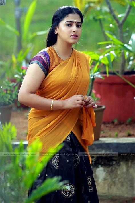 pretty lady anu sithara in saree latest exclusive hd photo gallery
