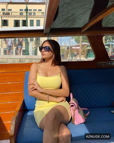 anushka sen looks alluring in a one piece yellow outfit aznude