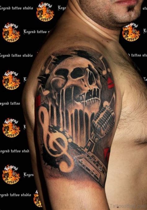 musical designer shoulder tattoos