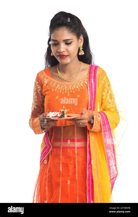 Beautiful Indian Young Girl Holding Pooja Thali Or Performing Worship