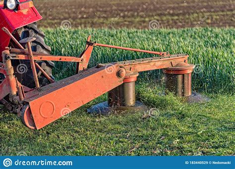 tractor  implements mower cuts clover tractor mowing paddock stock image image  bush