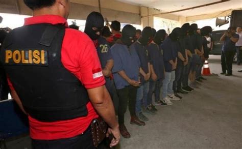 photos indonesian police arrest 141 men including a british man over