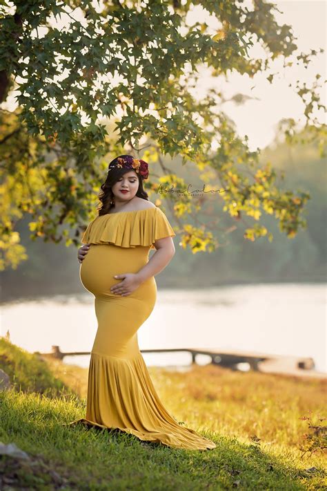 This Momma Is Rocking Our Mariahgown In Gold Pregnancyoutfits
