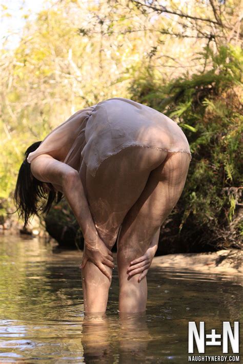 Aeryn Walker Cools Off Her Hot Body In A Stream Photos