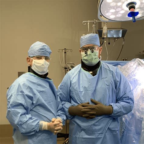 world renowned spine expert assists dr joseph cox during innovative