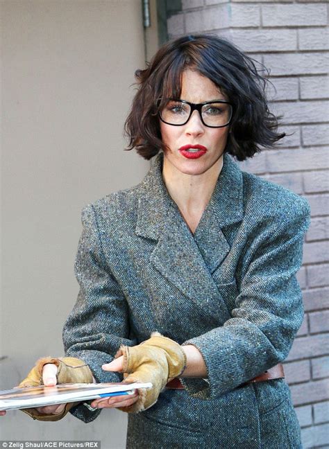 Evangeline Lilly Steps Out In Belted Blazer And Statement Glasses