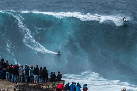 Surfers Take On Huge Waves At Praia Do Norte Off Portugal Coast Daily