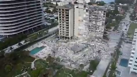 drone video shows devastation  partially collapsed miami beach condo building