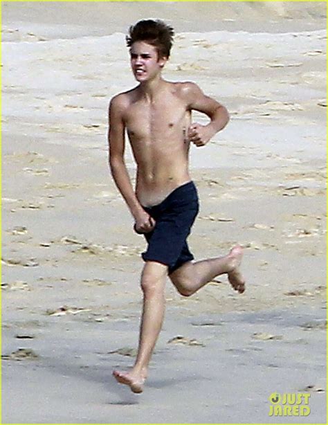 justin bieber shirtless in cabo with selena gomez photo 2615493