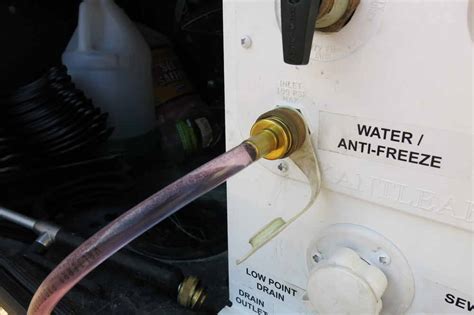valterra antifreeze hand pump  city water connection hose  rv winterizing valterra rv