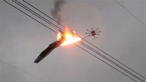 flame throwing drone removes  feet  netting wrapped   power   china