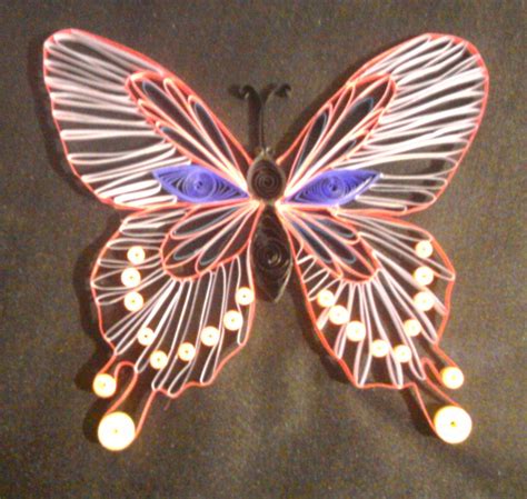 quilled butterfly fjaerilar