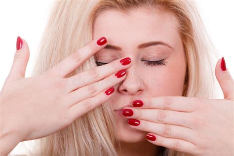 woman covering face  hands showing red nails stock photo image  hair face