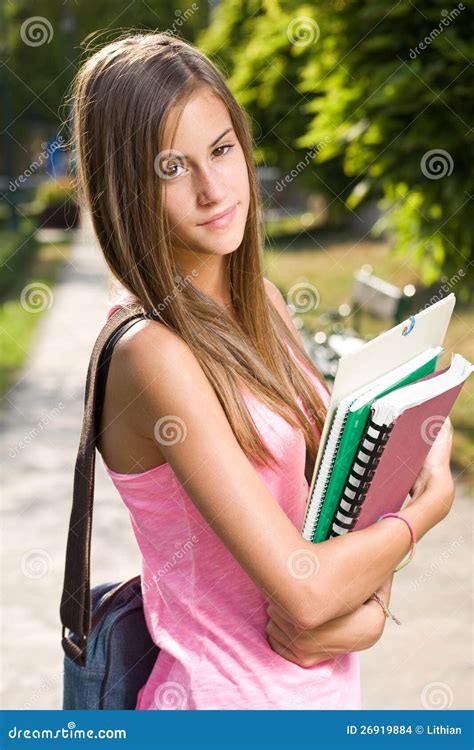 beautiful friendly teen student girl stock photo image  park holding