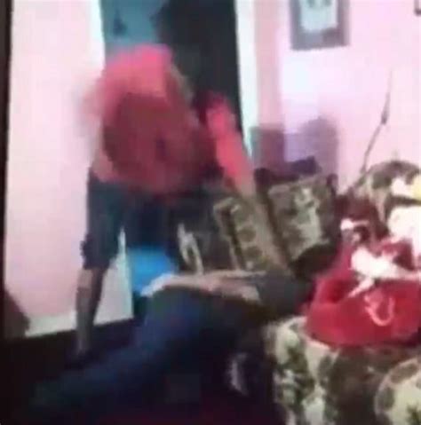 horrifying video of father beating girl with belt and shaving her head
