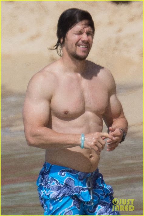 mark wahlberg shows off his six pack abs again during tropical vacation