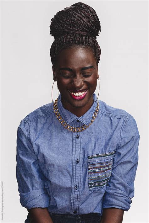 a pretty black girl laughing by stocksy contributor a model