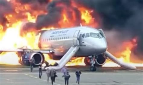 watch russia plane crash horror as passengers escape fire