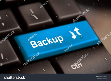 backup computer key  blue  archiving  storage stock photo