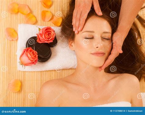 Face Massage Close Up Of A Young Woman Getting Spa Treatment Stock