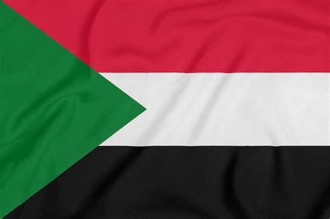 bandera de sudán sobre tela con textura símbolo patriótico foto premium