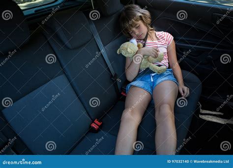teenage girl sleeping    seat  car stock photo image