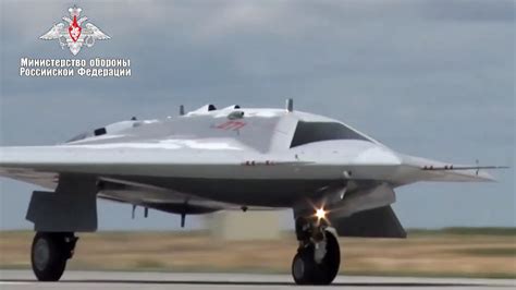 latest military video  russias  heavy combat drone   maiden flight rt world news
