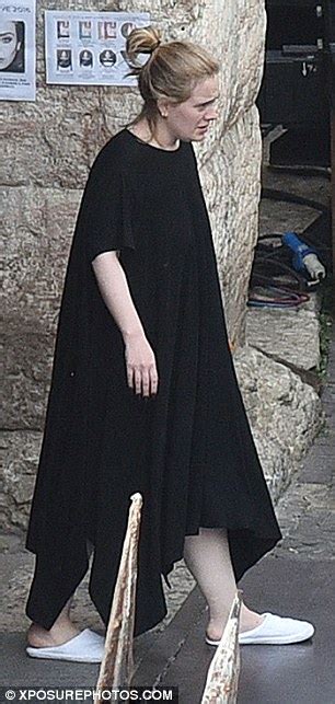 adele opts for a low key look as she steps out with son