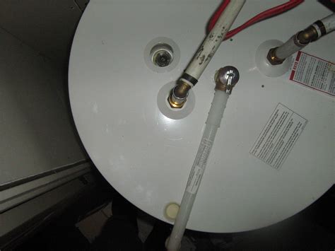 location  anode rod   giant electric water heater  remove