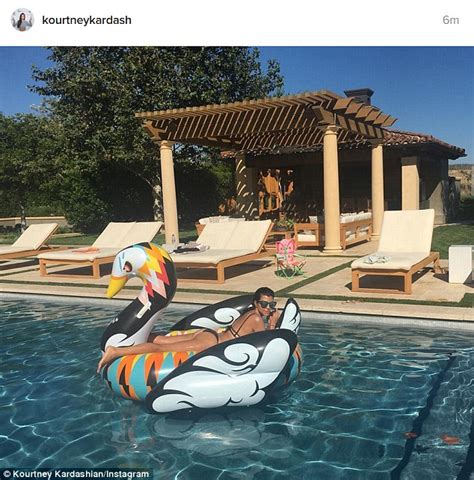kourtney kardashian shows off her bikini body as she takes a dip in the pool daily mail online