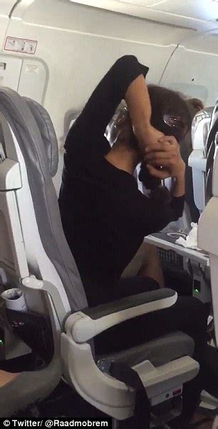 female passenger on flight from la to san lucas does yoga upside down is aisle daily mail online