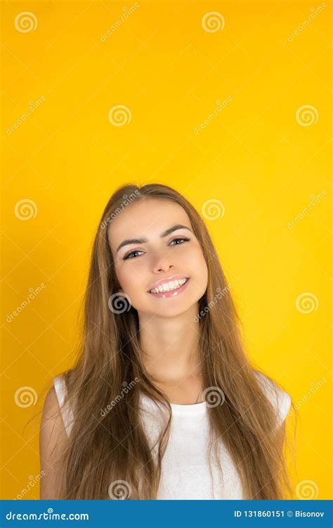 Headshot Of Pleasant Looking Friendly Cute Young Female Person Smiles