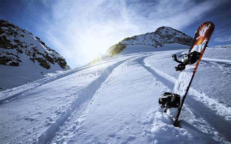 extreme snow snowboarding sports winter landscapes man mountains sky clouds surfboard wallpaper