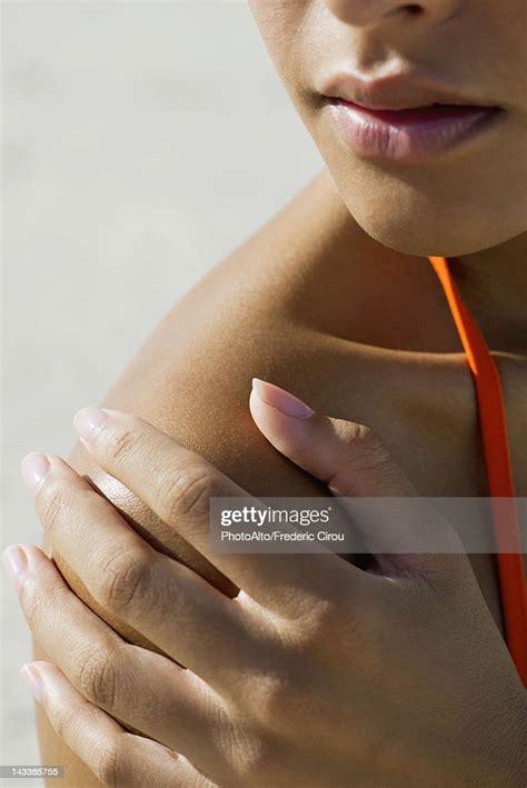 Woman Touching Bare Shoulder Cropped Photo Getty Images