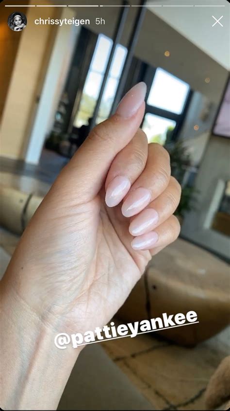 chrissy teigen wears press on nails at home — see photos allure