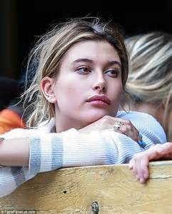hailey baldwin fails to raise a smile as she stops for sushi with