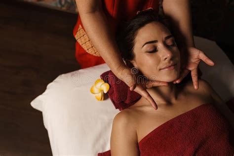 Brunette Woman Getting A Massage In A Spa Salon Stock Image Image Of