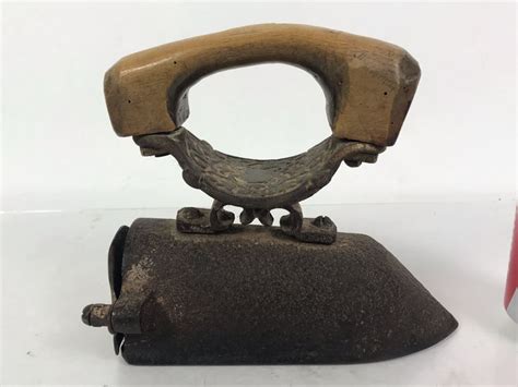 antique cast iron iron  wooden handle