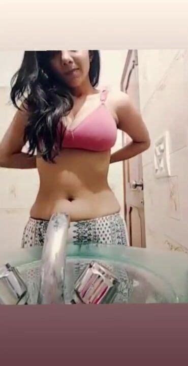sexy indian girl teasing with her big tits in bathroom