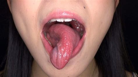 Enjoy As Her Long Erotic Tongue Wraps Itself