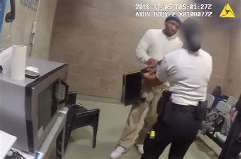 Prisoner Punches Guard As She Tries To Remove Laptop