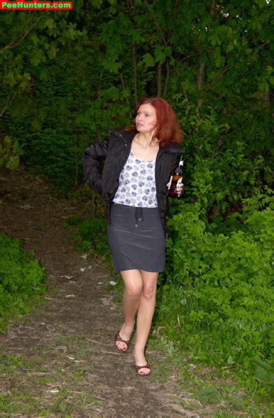 redhead slut peeing near river after beer drinking pichunter