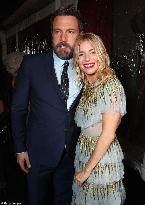 sienna miller gets cosy with co star ben affleck at live by night premiere daily mail online