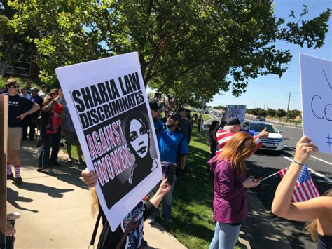 hundreds attend march against sharia event counter protest